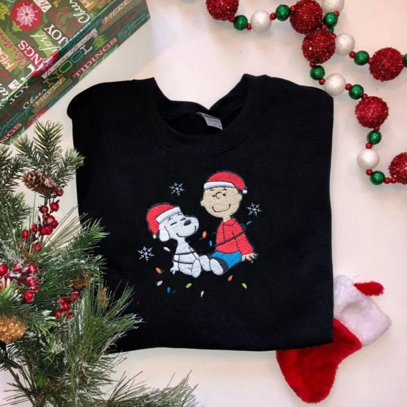 Introducing our "Y2K Style Christmas Embroidery" collection, featuring a delightful trio of unisex holiday apparel. This ensemble includes a Charlie and Dog Crewneck, a cozy Sweatshirt, and a warm Hoodie, all adorned with charming Y2K-inspired Christmas embroidery. 🎄 Nostalgic Y2K Aesthetic: Embrace the vintage charm of Y2K fashion with our unique Christmas embroidery, featuring beloved characters Charlie and Dog, as well as festive elements. This collection beautifully marries nostalgia with the holiday spirit. 👕🧥🎁 Versatile Selection: Choose your preferred style to ensure both comfort and fashion. Select the classic crewneck for a timeless look, opt for the snug sweatshirt, or stay warm with the hoodie – all while showcasing your festive spirit. 🌟 Holiday Magic: Our "Y2K Style Christmas Embroidery" trio captures the enchantment of the holiday season with a touch of Y2K flair. Celebrate in style, make cherished memories, and spread joy this Christmas. 🎄👕🧥🎁🌟 Make this holiday season extra special with our Y2K Christmas Embroidery Collection.